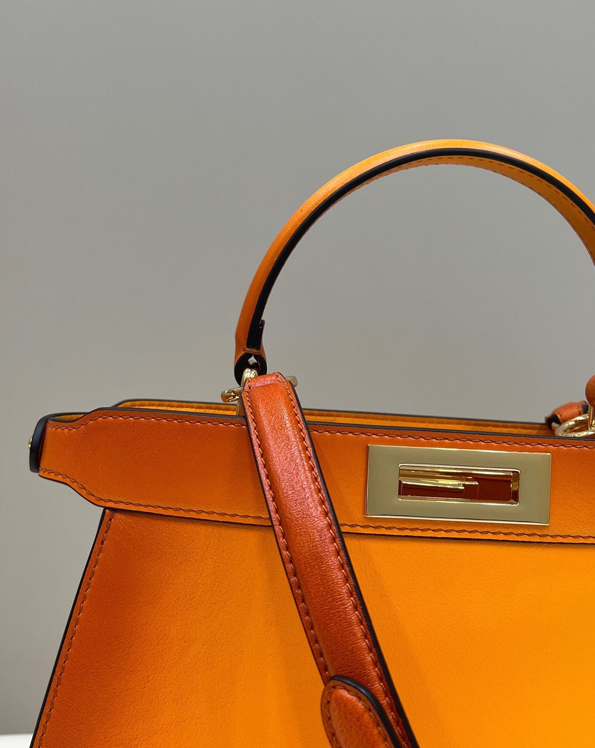 PEEKABOO ISEEU 33 IN ORANGE OMBRE SMOOTH CALFSKIN GOLD HARDWARE